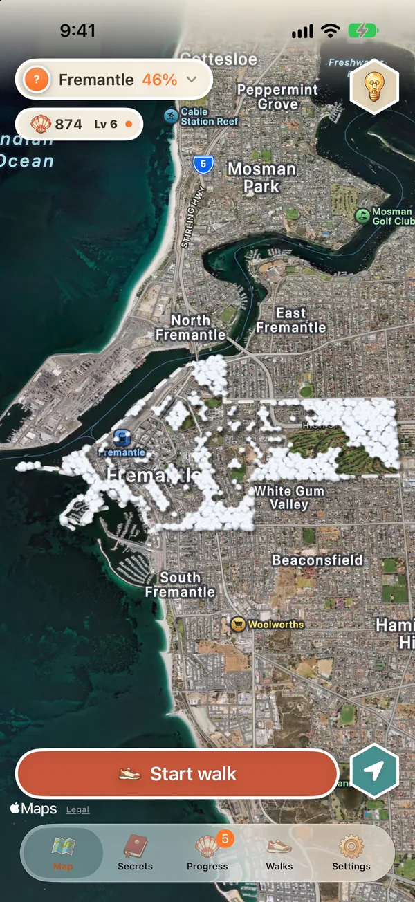 The map zoomed out over Fremantle in Perth, with the suburb under white clouds apart from the bits already walked, Fremantle at 46%, 874 shells, level 6 and the Start walk button